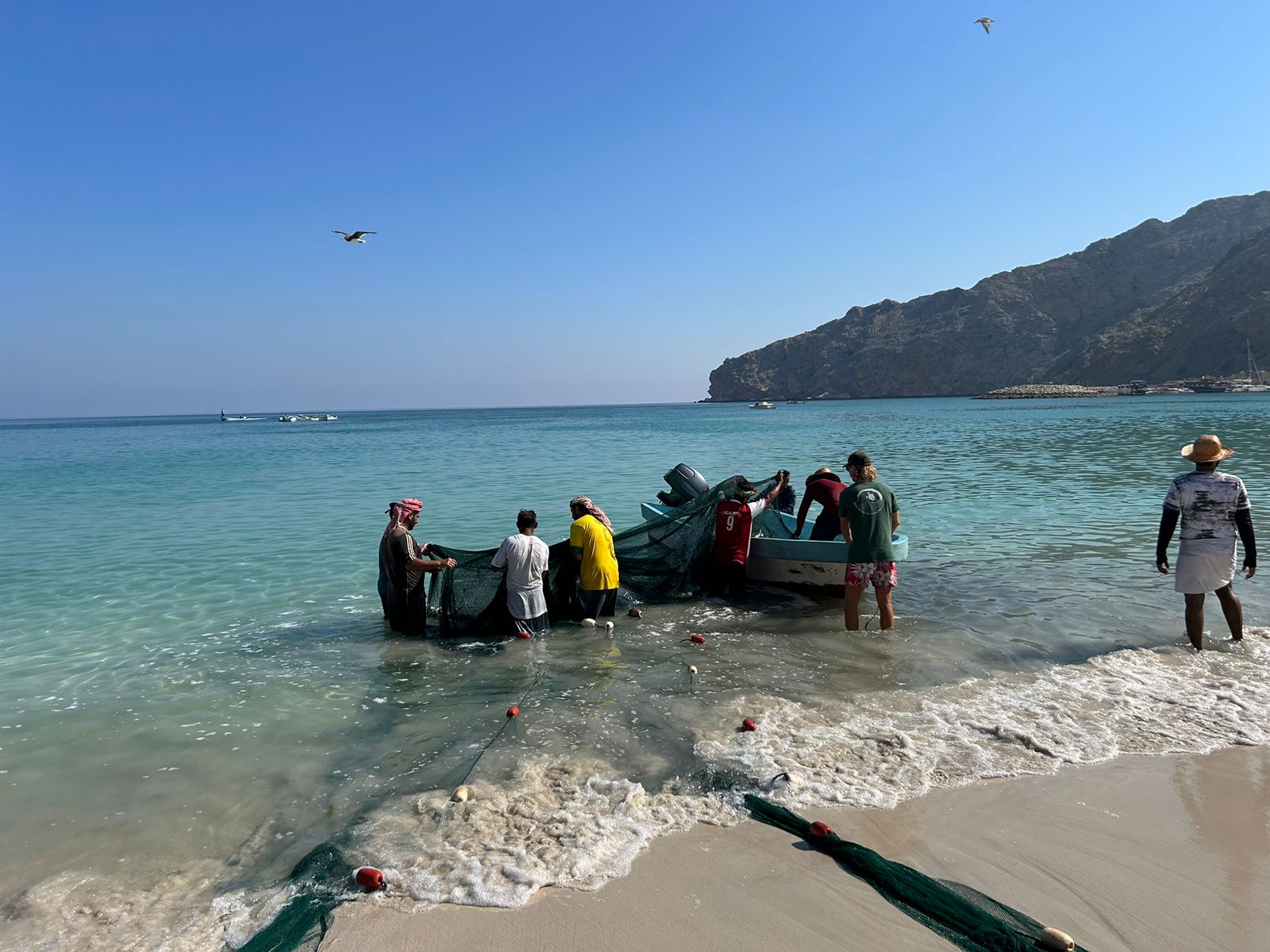 Fishermen Hauling in Nets