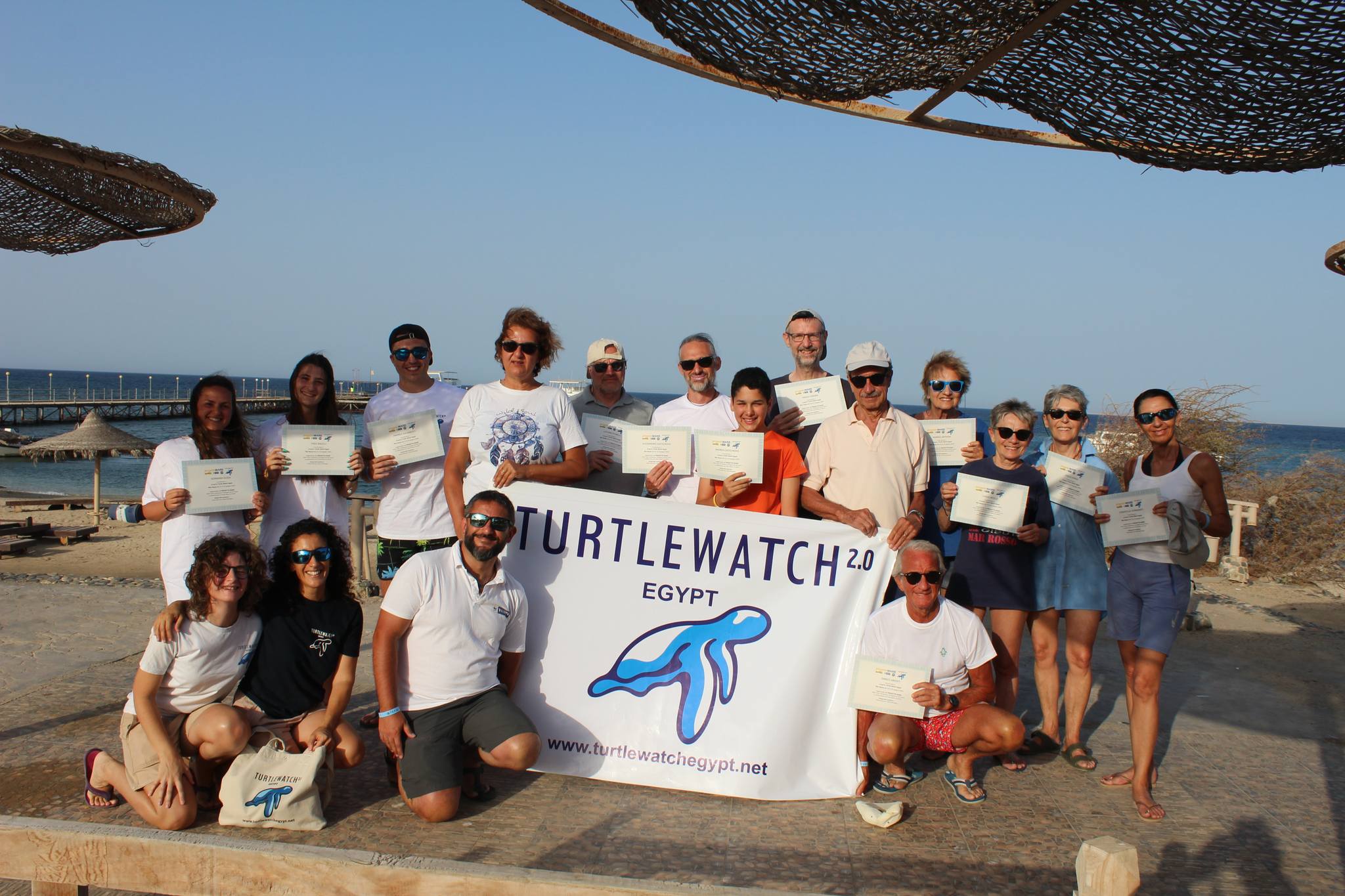 TurtleWatch Egypt participants and instructors holding certificates after completing the training. ©Turtle Watch Egypt 2.0